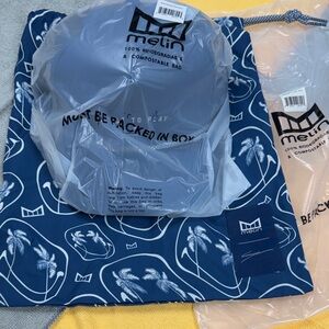 Melin Classic “Steel Lafferty” Blue Hat with matching cinch bag